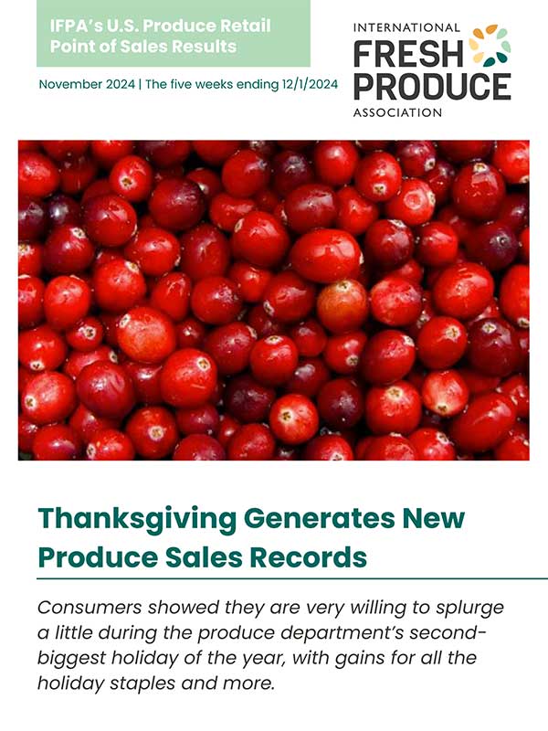 Image of fresh cranberries with text about record Thanksgiving produce sales.